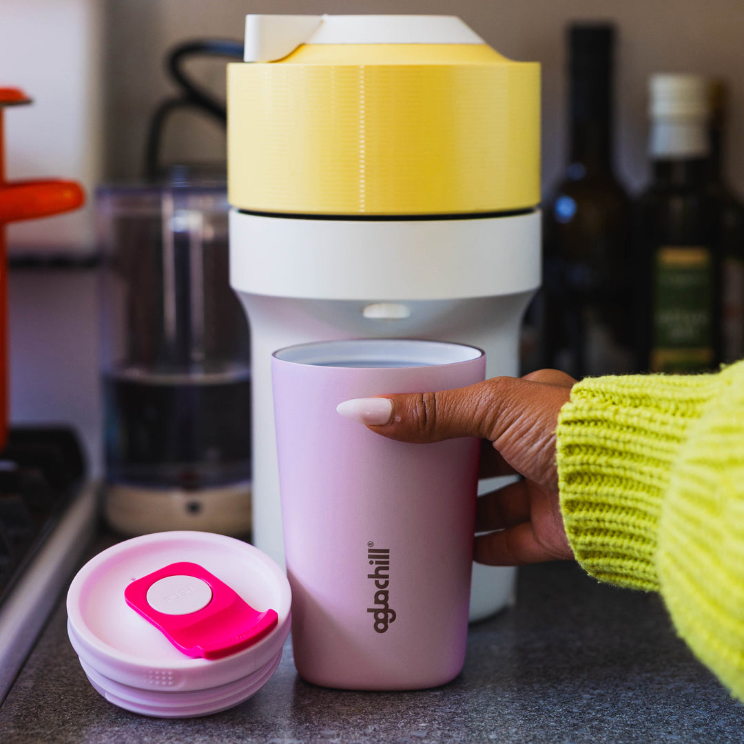 12oz_pushsip_ceramic_coating_triple_insulated_Stainless_Steel_coffee_mug_life style image_with coffee machine